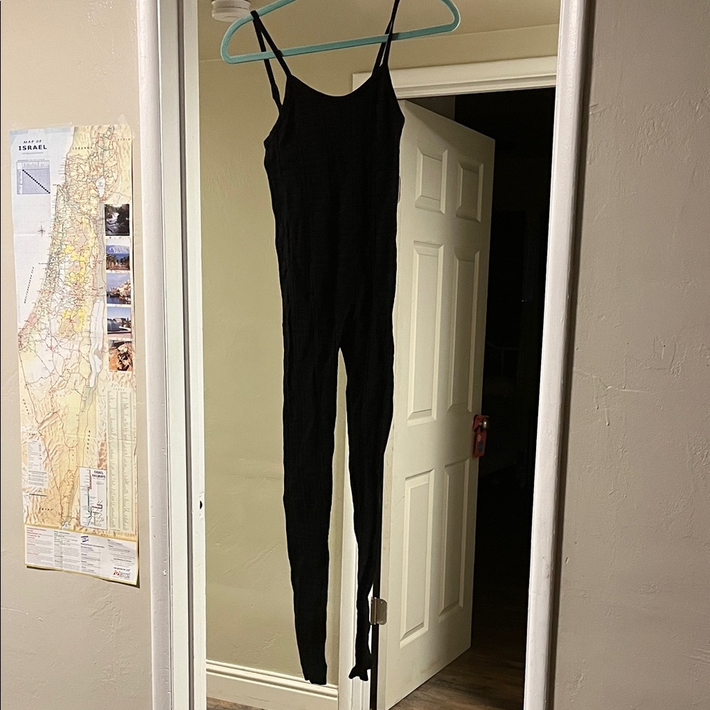 black, one-piece women's athletic bodysuit